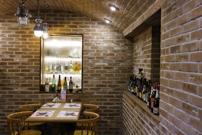 Inside Dewey's Pizza restaurant with warm lighting and welcoming atmosphere